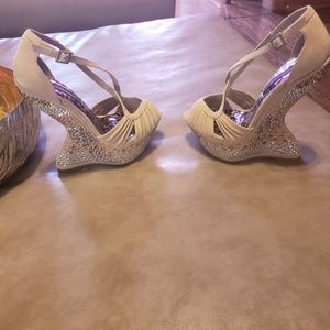 Size 6 heel less strapy high heel